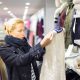 Beautiful woman shopping in clothing store